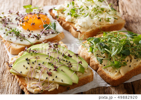 Dietary fitness toast with hummus, avocado, feta 49882920