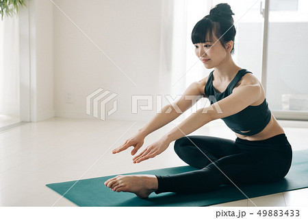 Training stretching young woman japanese - Stock Photo [49883433 