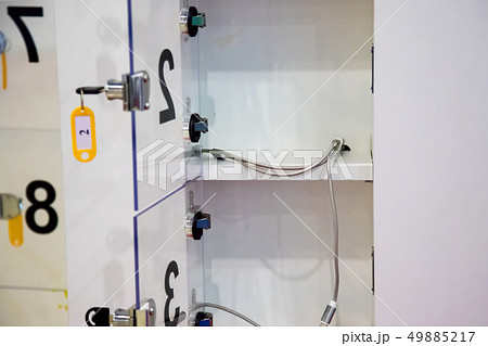 Free mobile charging station in shopping mall. 49885217