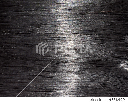 Shiny straight black hair background. Beautiful smooth brunette hair backdrop Shiny straight black hair background. Beautiful smooth brunette hair backdrop 49888409