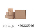 Stack of craft paper boxes and coil of rope isolated on white. 49888546