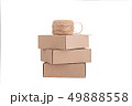 Stack of craft paper boxes and coil of rope isolated on white. 49888558