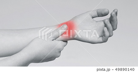 Carpal tunnel pain. Woman massaging painful wrist 49890140