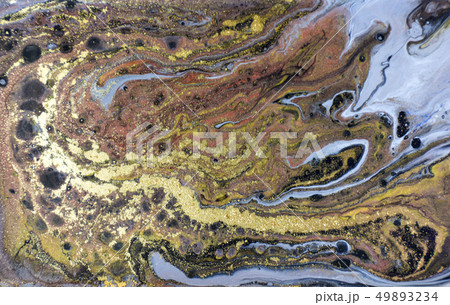 Gold, bronze and blue marbling pattern. Golden marble liquid texture. Gold, bronze and blue marbling pattern. Golden marble liquid texture. 49893234
