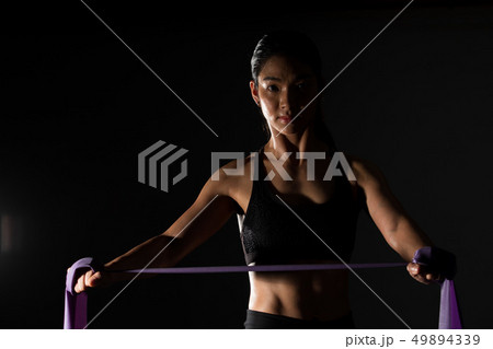 Fitness woman exercise stretch arms legs 49894339