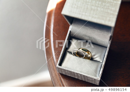 Wedding rings collected in a grey box on wedding Wedding rings collected in a grey box on wedding 49896154