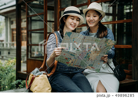 traveler holding guide discussing travel kyoto traveler holding guide discussing travel kyoto 49896285