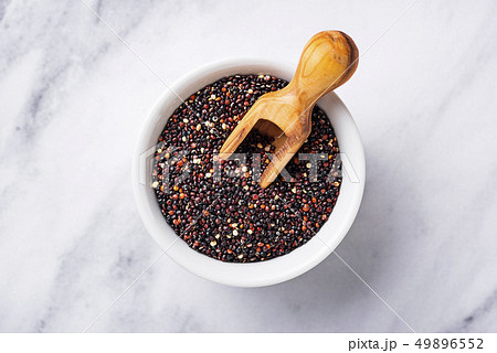Healthy black quinoa seeds in bowl Healthy black quinoa seeds in bowl 49896552