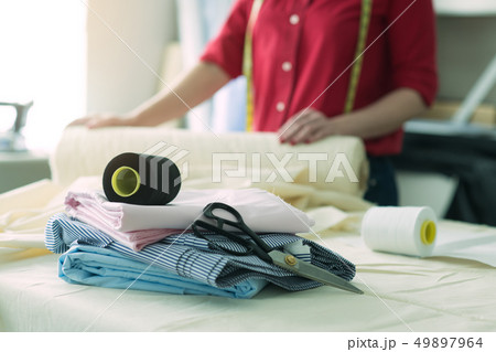 Tailor woman in atelier design working with sewing 49897964