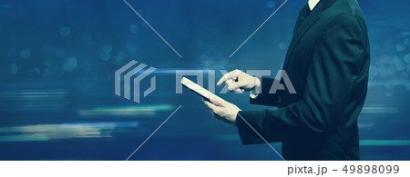 Businessman holding a tablet computer 49898099