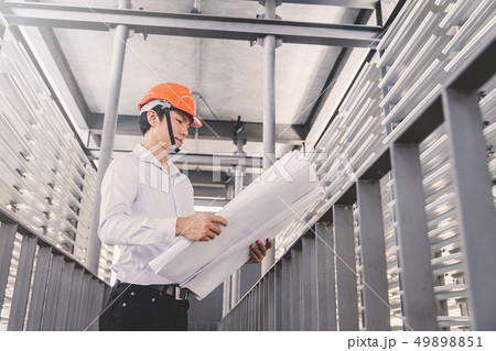 Consultant engineer discussing construction 49898851