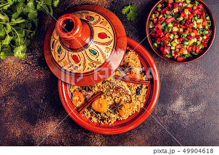 Traditional moroccan tajine of chicken with dried Traditional moroccan tajine of chicken with dried 49904618