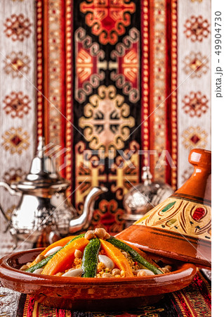 Vegetable tagine with almond and chickpea Vegetable tagine with almond and chickpea 49904730