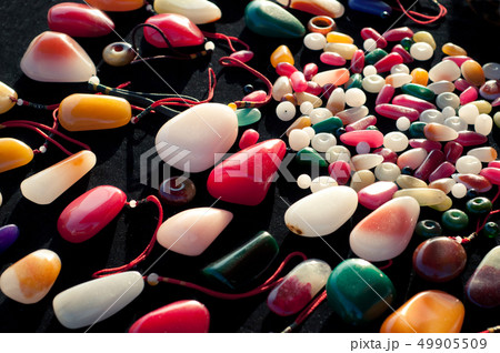 Many colorful jade stones in chinese market Many colorful jade stones in chinese market 49905509