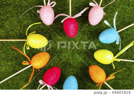Easter eggs on green grass. Easter eggs on green grass. 49905929