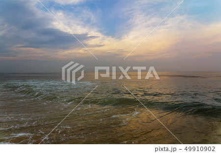 Panorama of beautiful sunset on the ocean. Panorama of beautiful sunset on the ocean. 49910902
