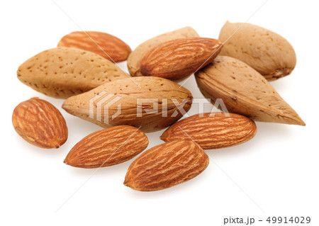 Heap of almonds isolated on white 49914029