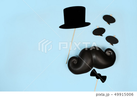 Father's day concept. funny moustache on blue background Father's day concept. funny moustache on blue background 49915006