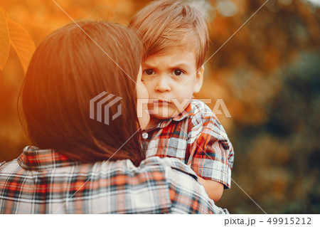 Big family playing in a autumn park Big family playing in a autumn park 49915212