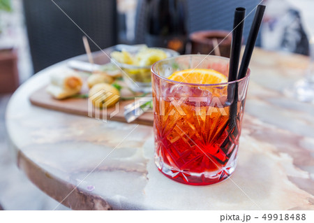 Mezcal Negroni cocktail 49918488