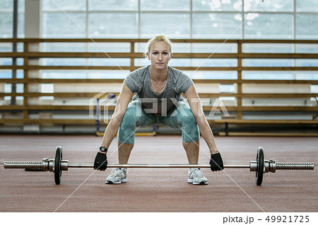 female athlete exercise deadlift 49921725