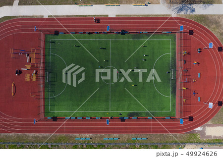 Street sports field with a football field. Shooting from the drone from above Street sports field with a football field. Shooting from the drone from above 49924626