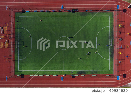 Street sports field with a football field. Shooting from the drone from above Street sports field with a football field. Shooting from the drone from above 49924629