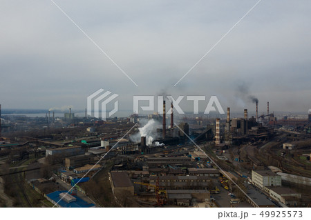 Polluting plant shot from above with a drone 49925573