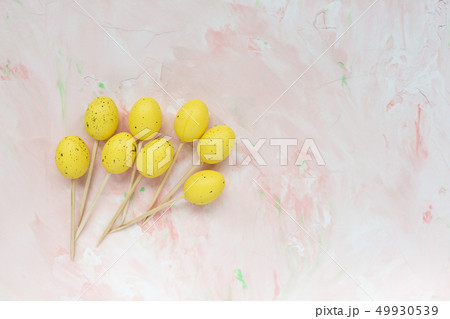Easter sticks for appetizers on a pink background. Easter sticks for appetizers on a pink background. 49930539