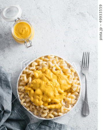 Pasta with vegan creamy chia cheddar sauce 49933559