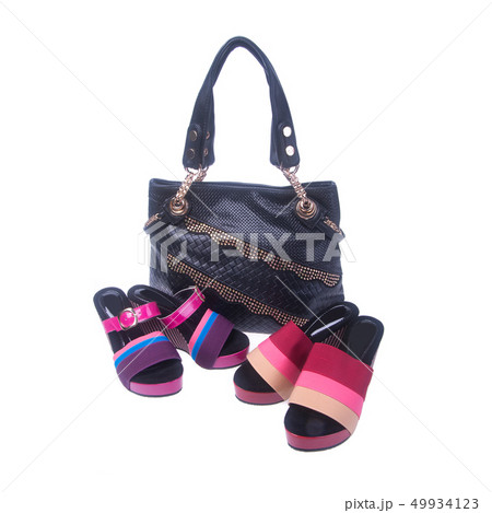 bag or women shoes and handbag on background. bag or women shoes and handbag on background. 49934123