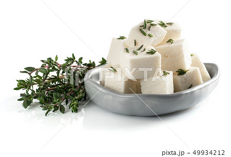 diced soft cheese isolated 49934212