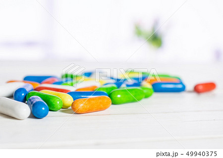 Licorice sweet comfit with red tulips Licorice sweet comfit with red tulips 49940375