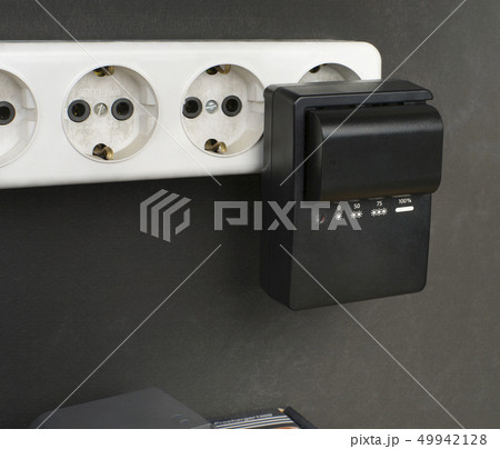 extension cord, charger and battery from the 49942128