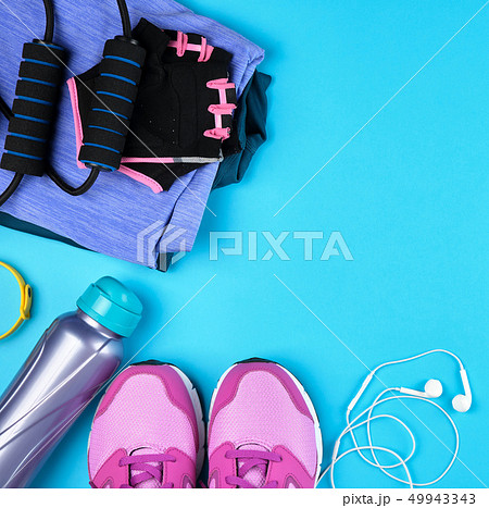 pair of pink sneakers with laces pair of pink sneakers with laces 49943343