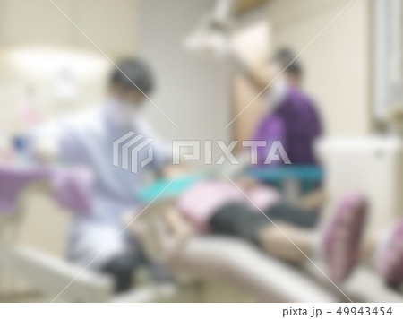 Dentistry blur background with dentist working  49943454