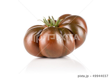 Fresh dark tomato primora isolated on white Fresh dark tomato primora isolated on white 49944037