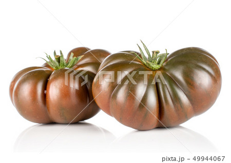 Fresh dark tomato primora isolated on white 49944067