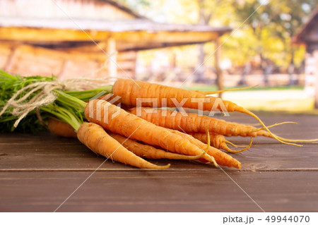 Fresh orange carrot with cart 49944070