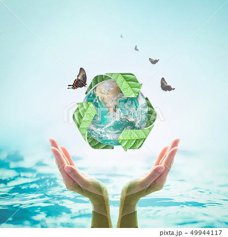 Green planet with recycle sign on hands  49944117