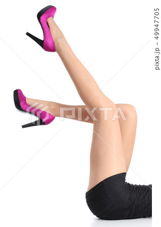Beautiful woman legs with fuchsia high heels and Beautiful woman legs with fuchsia high heels and 49947705