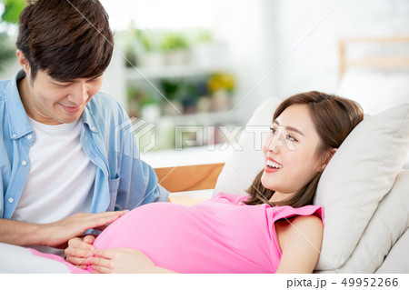 pregnant woman with her husband pregnant woman with her husband 49952266