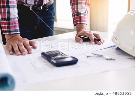 Close-up Of Person's engineer Hand Drawing Plan On Close-up Of Person's engineer Hand Drawing Plan On 49953959