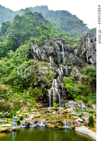 Waterfall at Hang Mua Cave at Trang An, Vietnam Waterfall at Hang Mua Cave at Trang An, Vietnam 49955864