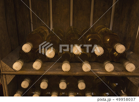 Wine bottles in wine crate, self brewed close-up 49958037