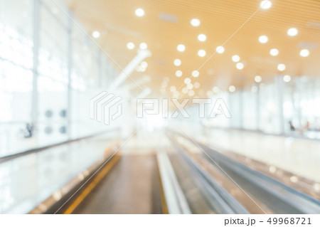 Abstract blur and defocused airport passenger terminal for transportation interior 49968721