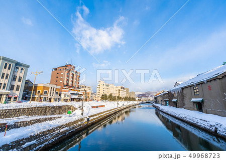 Beautiful landscape and cityscape of Otaru canal river in winter and snow season 49968723