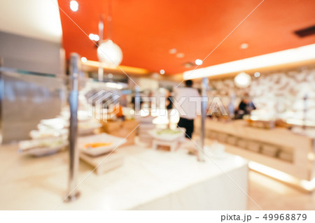 Abstract blur and defocused breakfast buffet in hotel restaurant and coffee shop cafe interior Abstract blur and defocused breakfast buffet in hotel restaurant and coffee shop cafe interior 49968879