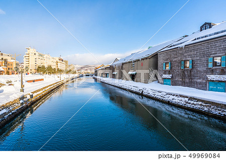 Beautiful landscape and cityscape of Otaru canal river in winter and snow season 49969084