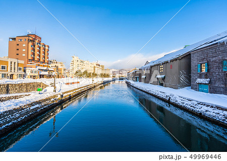 Beautiful landscape and cityscape of Otaru canal river in winter and snow season 49969446